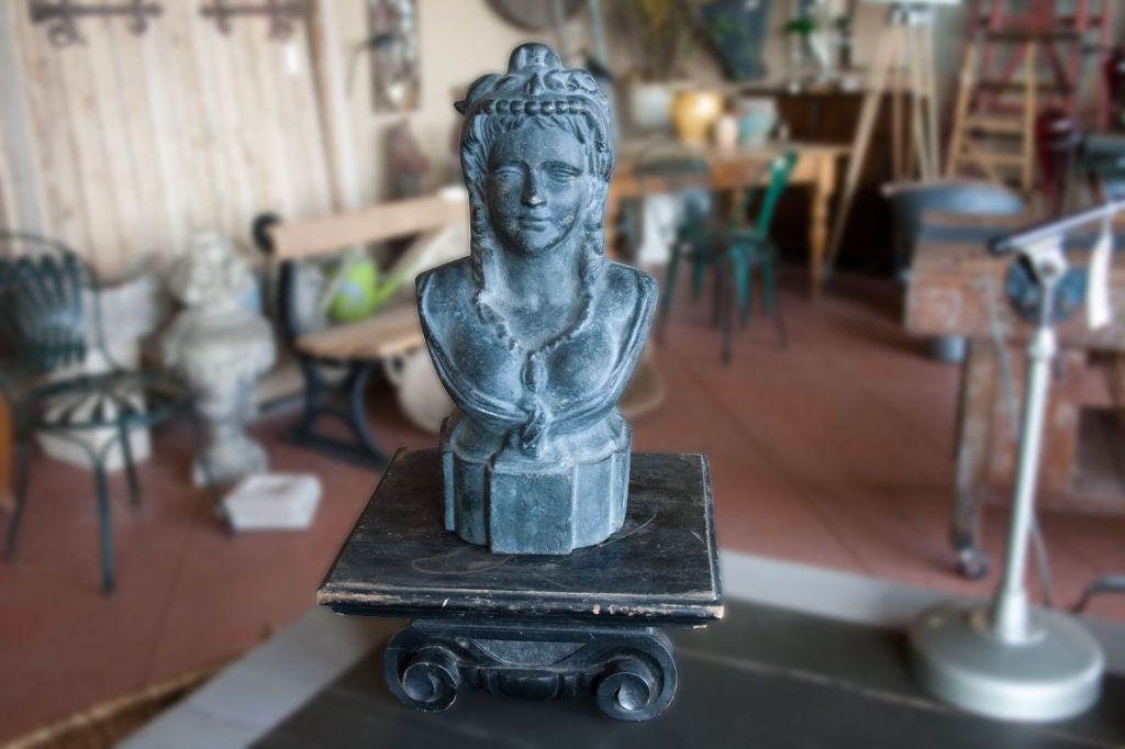 19th century cast iron French bust of Marianne. She is a national emblem of France present in almost all law courts and town halls. She symbolizes the 