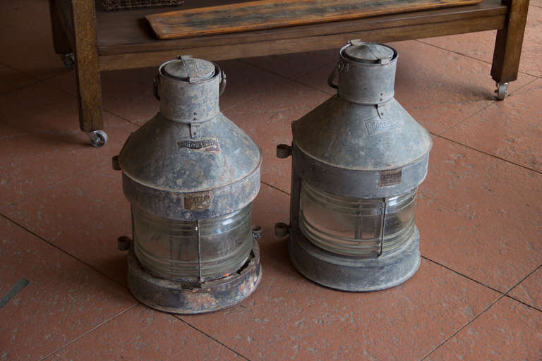 Pair of large vintage Masthead galvanized starboard and port nautical lanterns by Meteorite.

One lamp has some rusted parts and to the base a missing back.  

