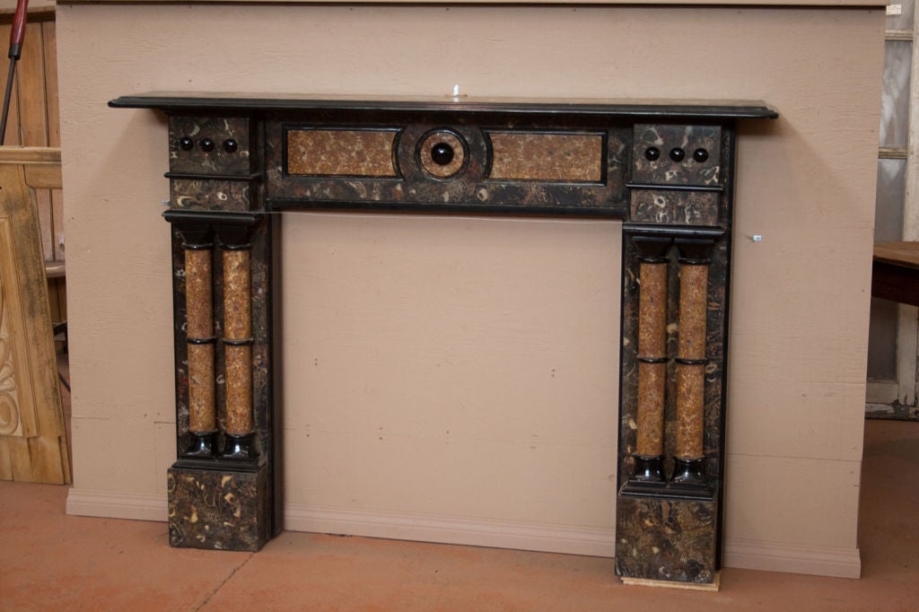 In the 18th and 19th century slate was considered a poor man's material and many chimneypieces were faux painted to look like more expensive wood graining or marble, others were left black. From the 1950s-1980s these hand-painted chimneypieces were