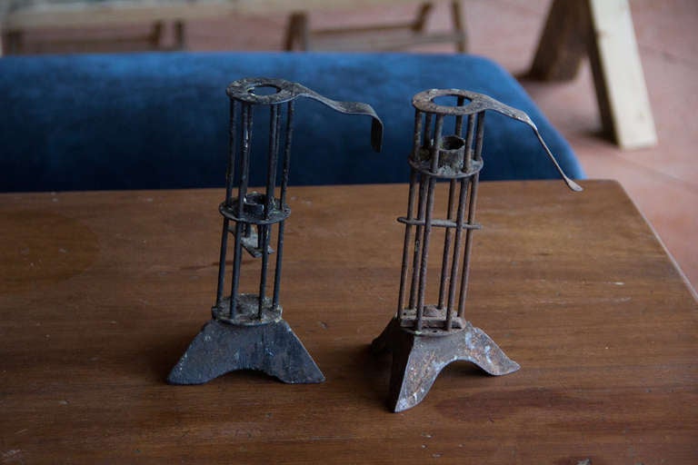 Pair of rare wrought iron adjustable candle stands that would have once been used in the wine cellars of France, circa 1850.

Great pieces to add to the Oenophile collection!