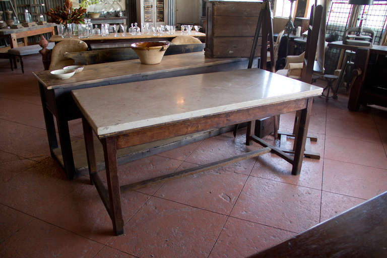 Beautiful 19th century French oak stretcher base charcuterie table with substantial Comblanchien marble top, from the Cote d'Or, France. 

Would make a great kitchen island!