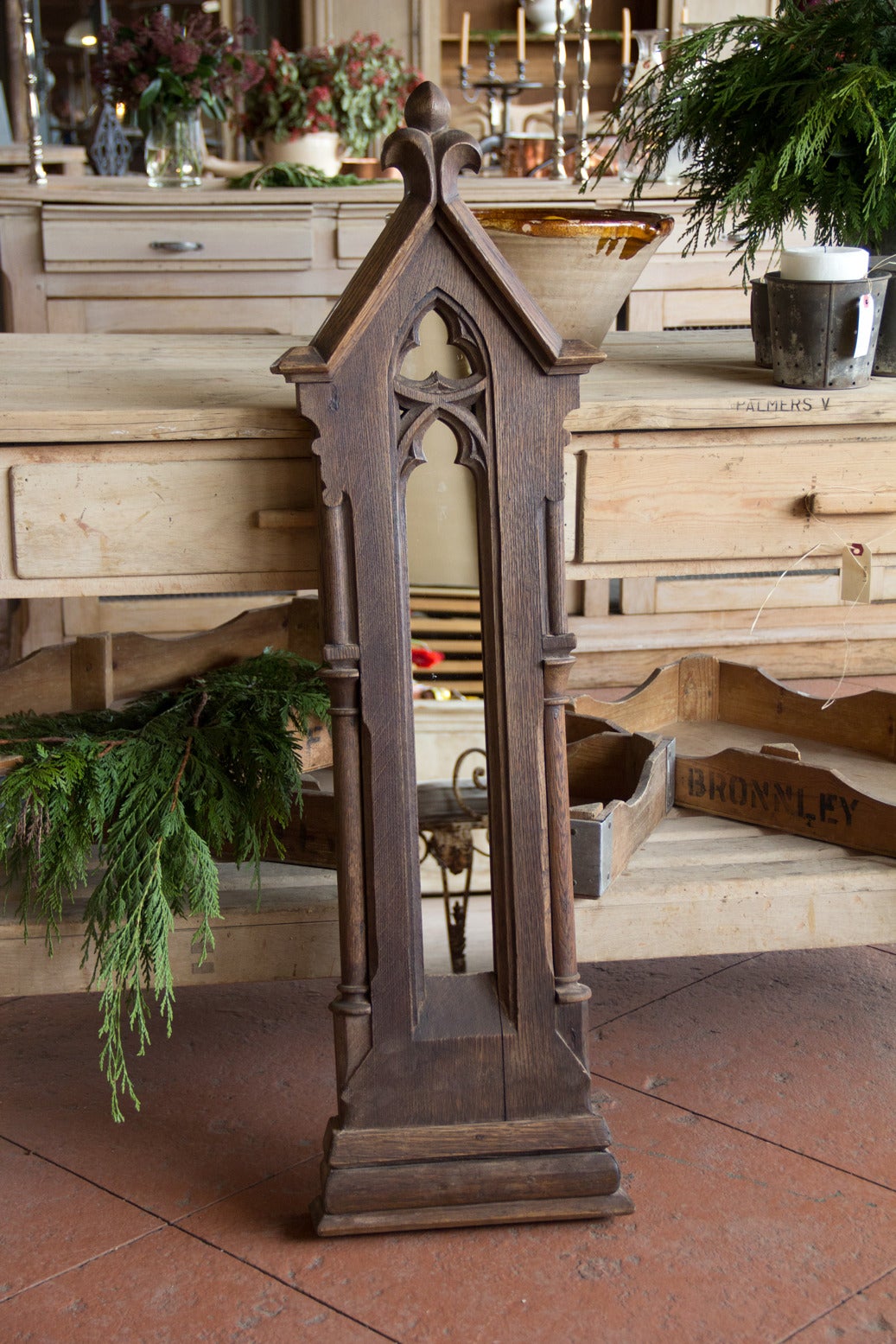 Antique carved oak French Gothic lancet window. The window has been mirrored out.  We currently have 6 available and listed price is for one. Great hallway mirror!