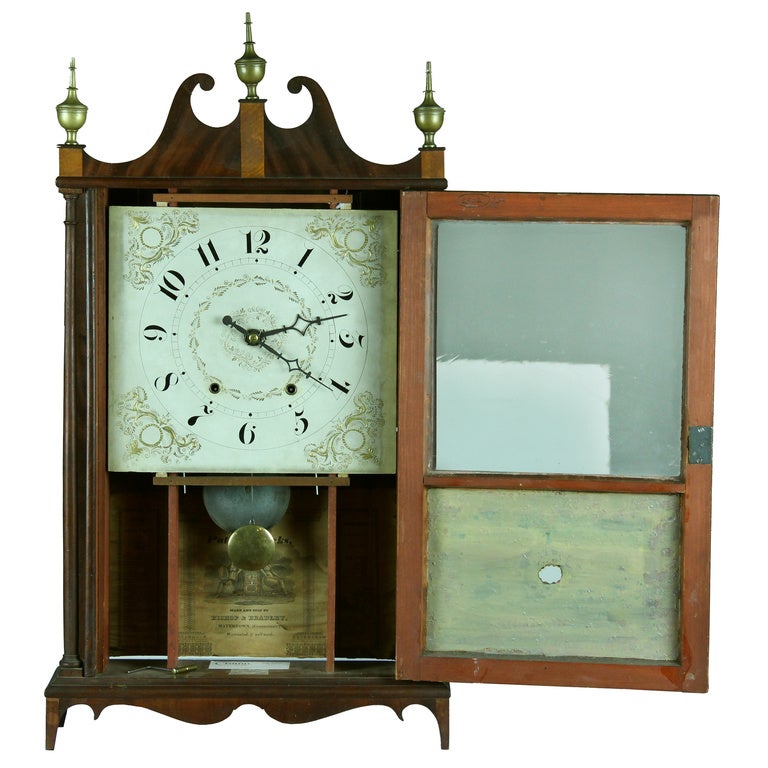 This clock has a superb provenance, Kirtland Crump, who handled this clock last. He's one of the two major authorities in the field we recognize for handling fine legitimate clocks.

What sets this clock apart from the rest is the reverse