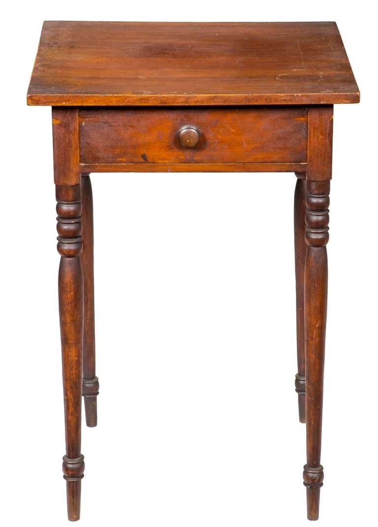 This worktable has its original grimy first surface, which is aged and quite dry. It retains its original drawer pull. What attracts us to this table is not only its untouched state, but the very long beautifully turned slender legs make a stylish