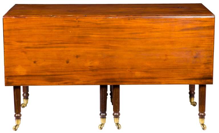 Mahogany Drop-Leaf Table with Eight Reeded Legs, Probably American, circa 1810