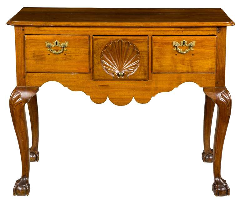 This is a magnificent large walnut base to a highboy that has had a walnut top fitted that has aged beautifully with the rest of the piece, and functions as an elegant server. This base is completely original and retains its deep mellow color. As it