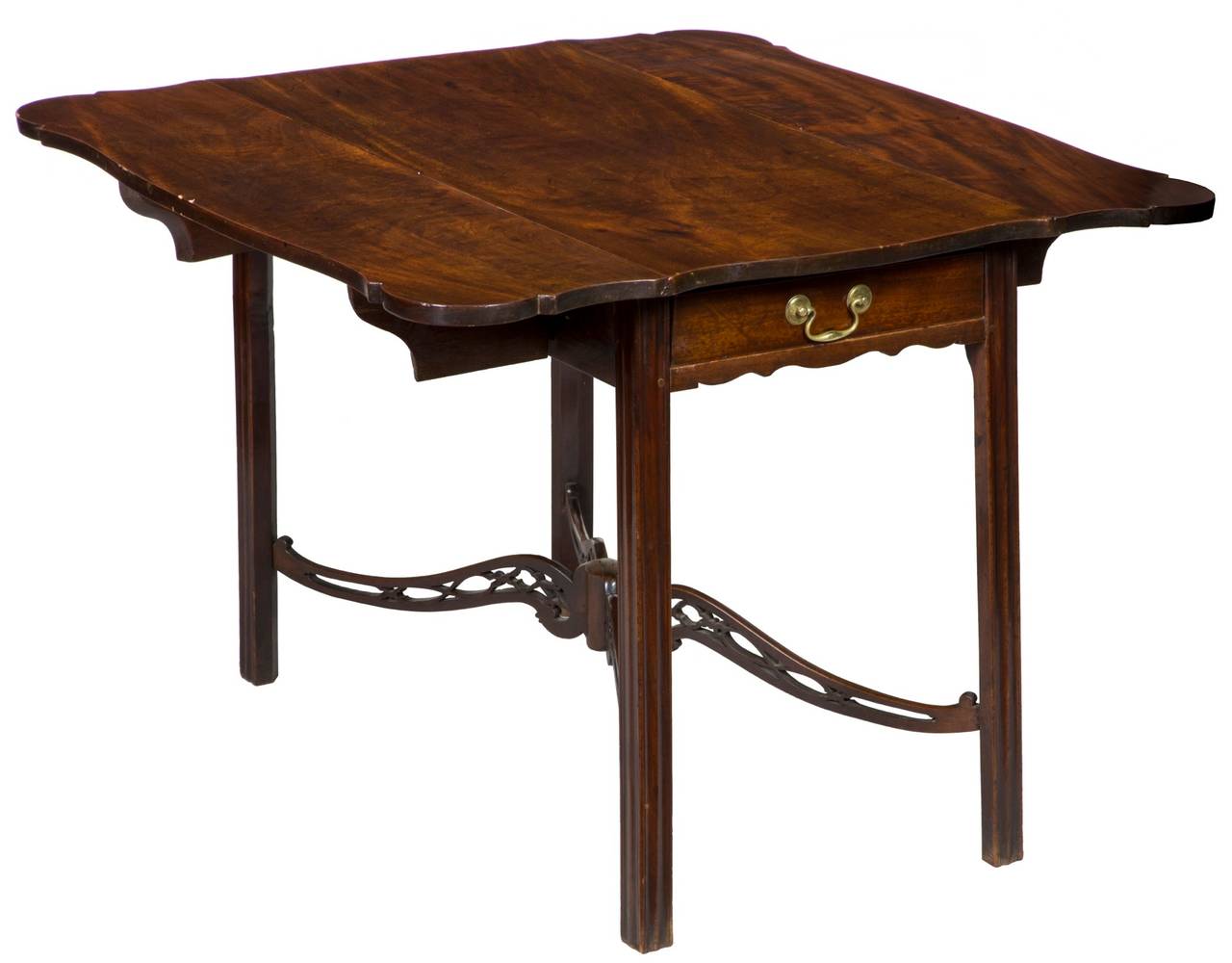 This impressive pembroke is large in scale, enough to accommodate four people that would enjoy seeing the great figured solid Cuban mahogany with rare porringer ends. This table speaks of quality and development throughout. For example, see the