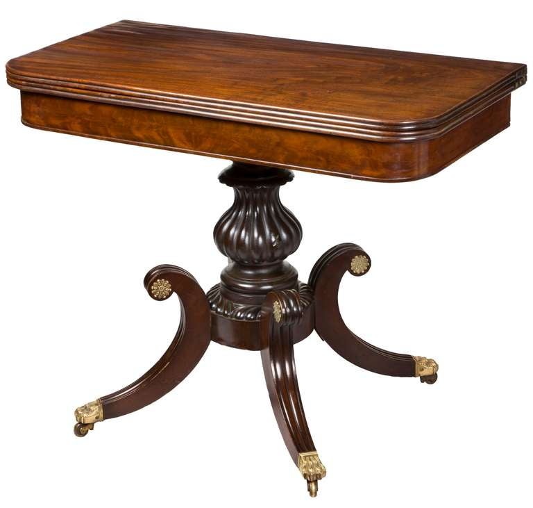 We have sold a number of these tables, as they appear to be quite popular. What impressed us with this table is the magnificent reeded central column. This is hand-carved, and in our detail shot, you can see the beautiful hourglass form. Also, the