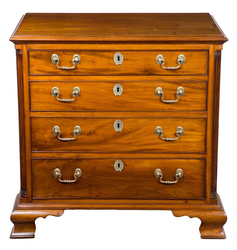 The small-scale bureau doesn’t come any smaller than this highly desirable 32 inch wide example, which is desirable because it is serviceable as a bedside bureau, as well as in living areas. The colors are of a beautiful yellow sun bleached mahogany
