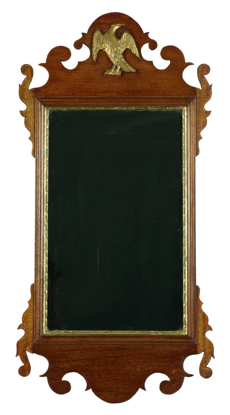 This mirror was a very popular form and a mate to it is illustrated in The Mirror Book,  Herbert Schiffer (see image).  Another example appears in vol.III of Israel Sack's American Antiques (see image). While these mirrors were made in great number,