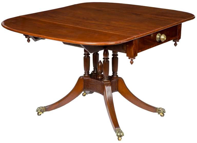 This table has drop leaves and a top of the solid with strong, vibrant figure. These New York tables always were made in the Phyfe workshop and/or by other makers in close proximity at this time, i.e. a related drop leaf made by Lannuier illustrated