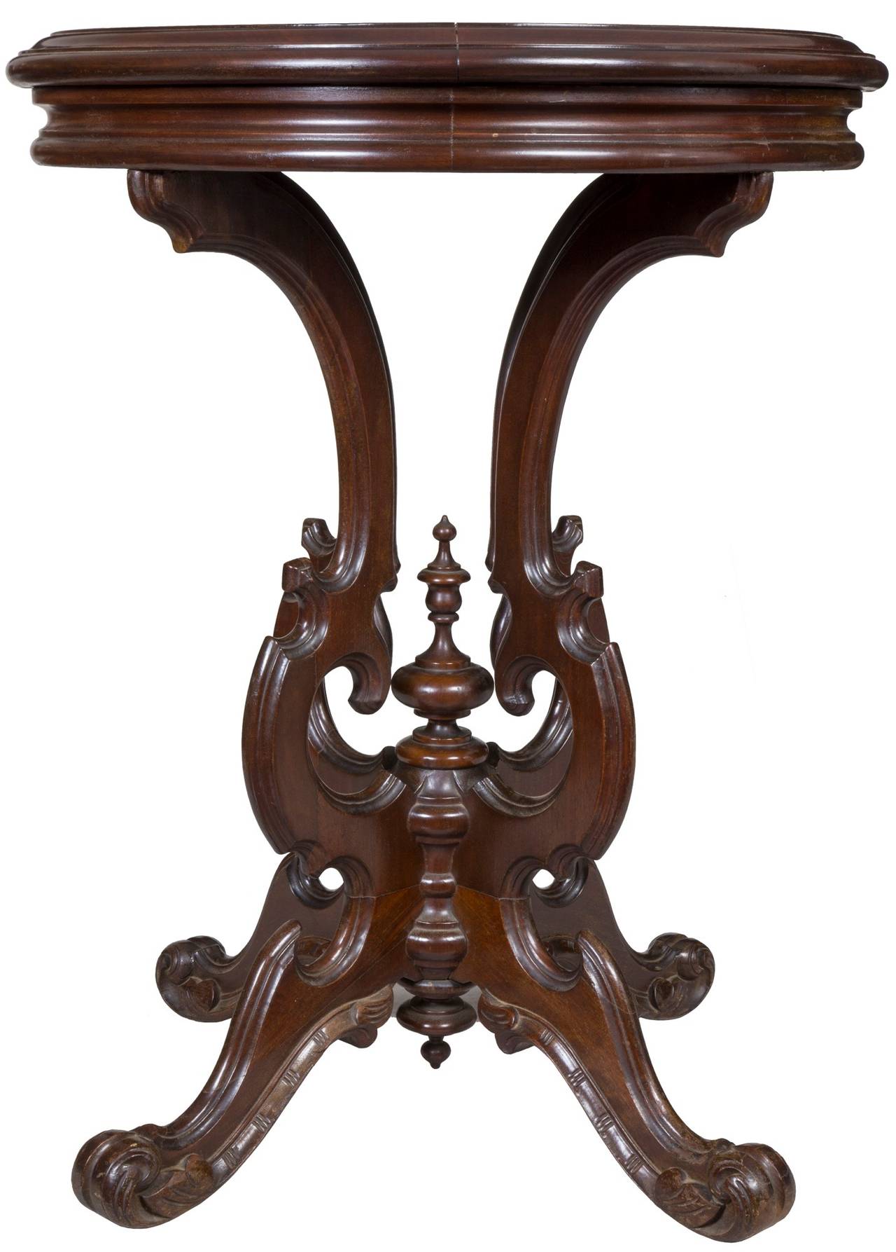 This stand has a magnificent reverse painting that retains its brilliant color, and the lyre, with flowers at its base is a real standout. The walnut table is solid, and the turnings, both top and bottom are truly magnificent, and indicate a high