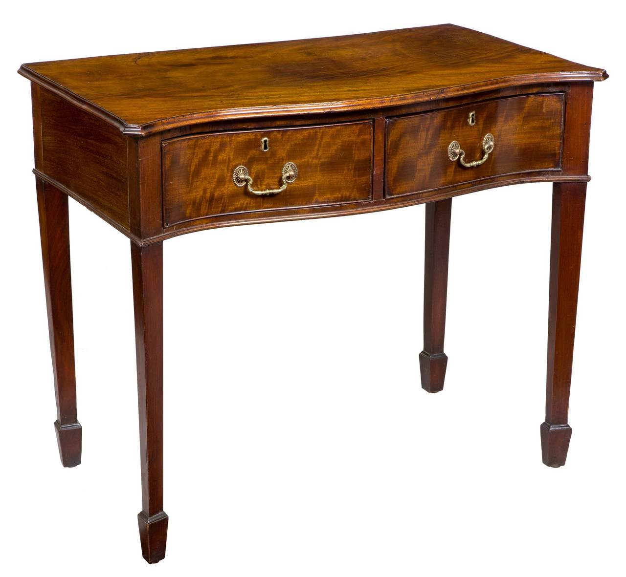 This is a particularly useful small-scale server with an exceptionally beautiful solid one-board mahogany top. Note the figure on the top board; it was obviously selected for dramatic effect. The front is serpentine in shape and has tapered legs