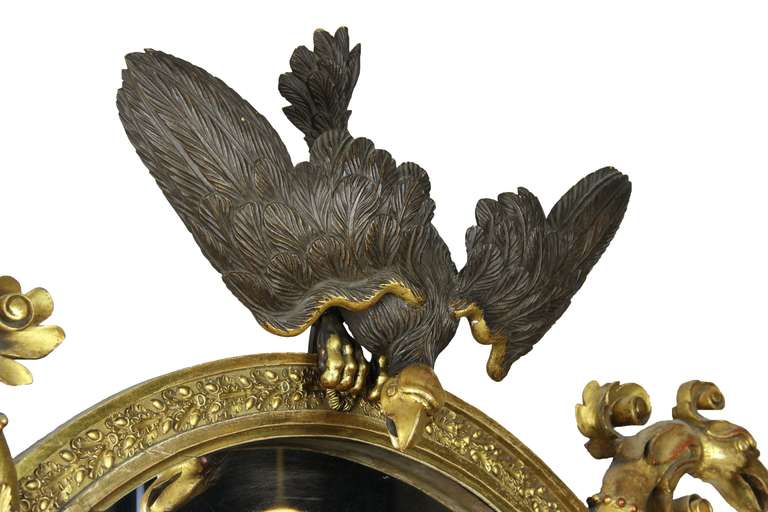 Classical Parcel Ebonized Giltwood Mirror American or English