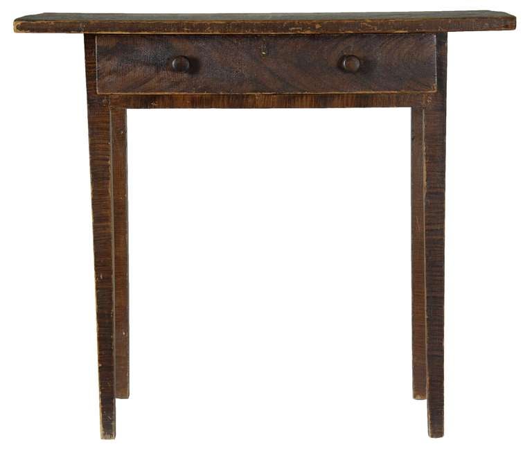 This is a simple table and in pure condition it retains its wonderful wood simulated graining throughout. We have not cleaned down this surface, as many would prefer this piece in untouched condition, which it is. But look at the top, the