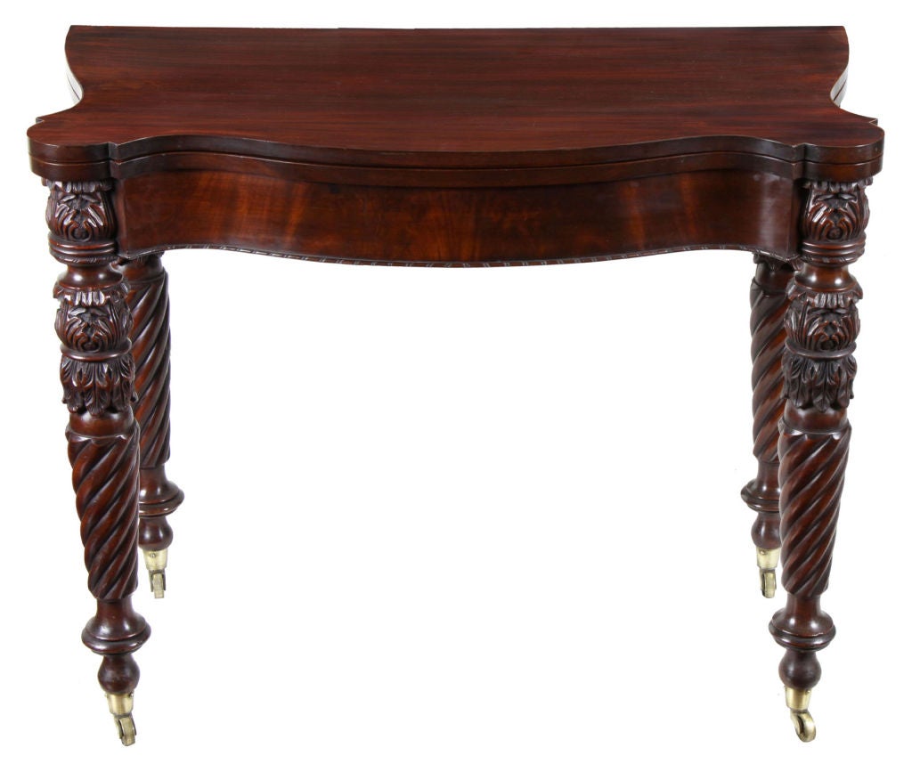 An Exuberantly Carved Federal Mahogany Card Table, Salem, <br />
Attributed to the McIntyre School, c.1820-25<br />
<br />
This card table, which is in a pristine state of preservation, is one of the most exuberant of the form we have handled.