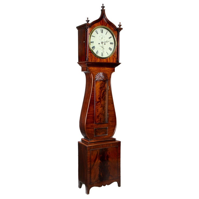 A mahogany Regency lyre tall case clock with block and shell, attributed to David Greig, Perth, 1810-1831.

This clock encompasses one of the most dramatic design changes in the British / American clock repertoire. Not only is there dramatic lyre