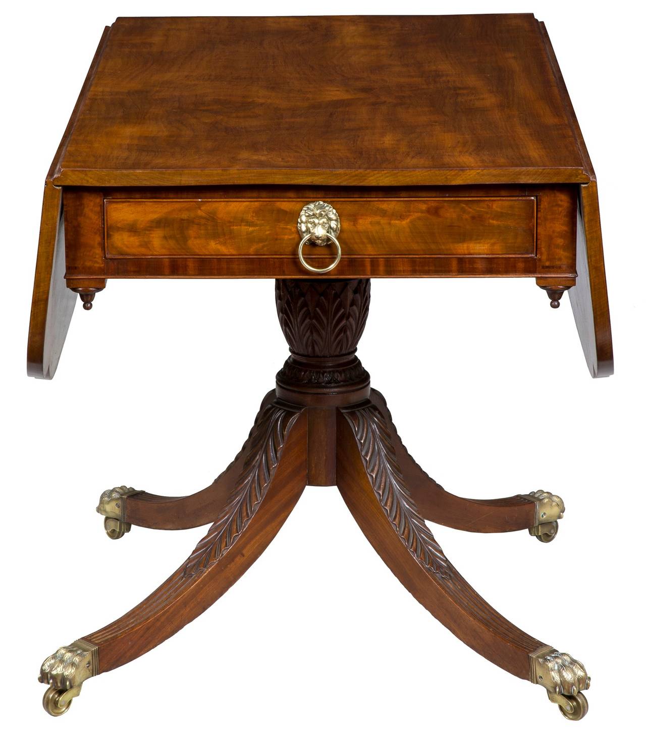 For the grouping of these drop-leaf tables that were produced in New York, this table is probably at the top of the class. The best of this form has acanthus leaf carving that is very well developed and scooped out under each leaf. Some have