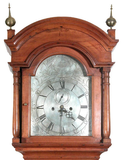 This is a tall country clock produced by Squire Millerd (often spelled 