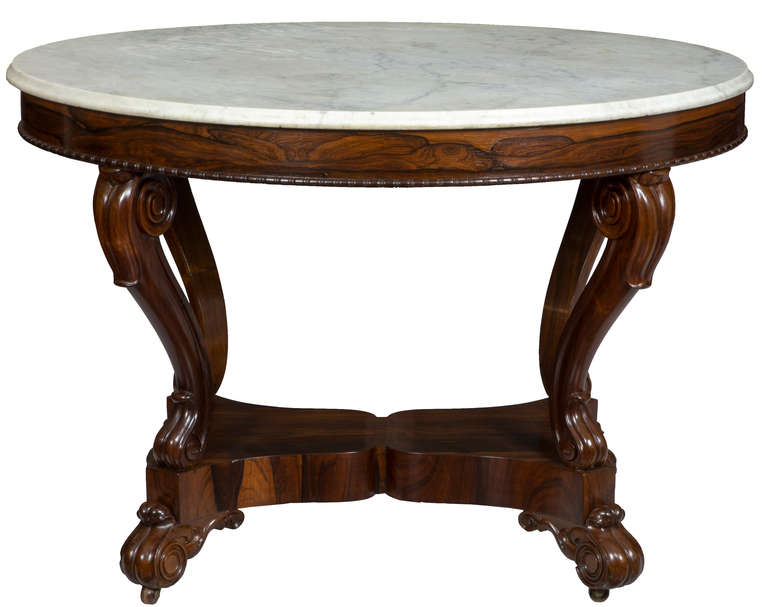 Classical furniture in rosewood is quite rare, as, at that time, mahogany was the imported wood of choice in furniture. Rosewood became available at the end of the first quarter of the 19th century, and is a magnificent wood showing striking ribbon