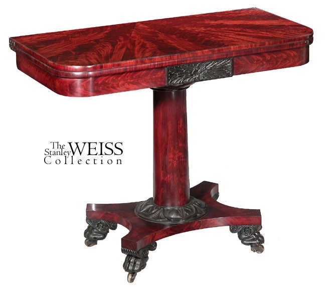 This pair of card tables has magnificent sectioned mahogany tops that are absolutely dramatic. See the image of both tabletop together. Beyond highly figured mahogany, the carving is quite exceptional and complementary to the austere Nature of