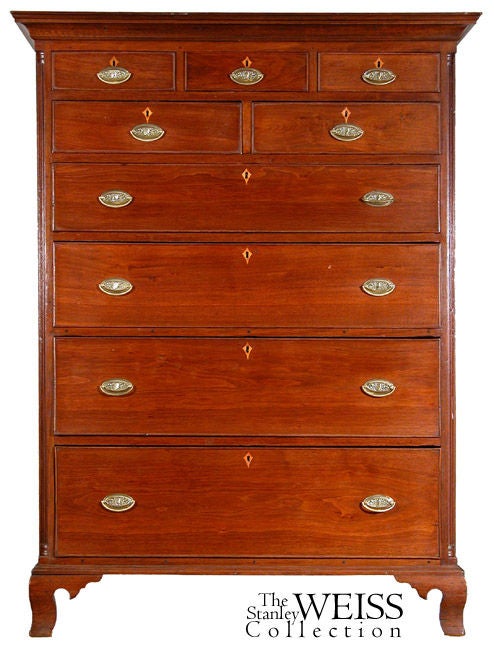 This is a commodious tall chest in superb condition. The walnut has a mellowed amber color, which has been waxed over the years. This is a heavy chest, and structurally, it is built like a house. Note that this chest retains a full dustboard above