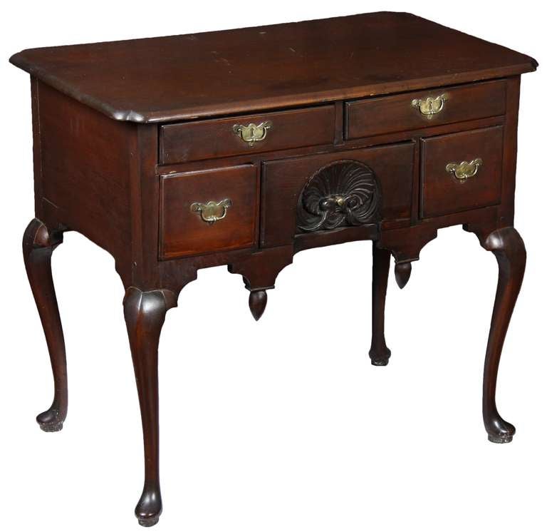 Originally, this was black lacquered with a gilt shell, and was a companion dressing table to the high chest illustrated as cat. no. F77 in American Decorative Arts and Paintings in the Bayou Bend Collection, David B. Warren et al, pp. 44-46. While