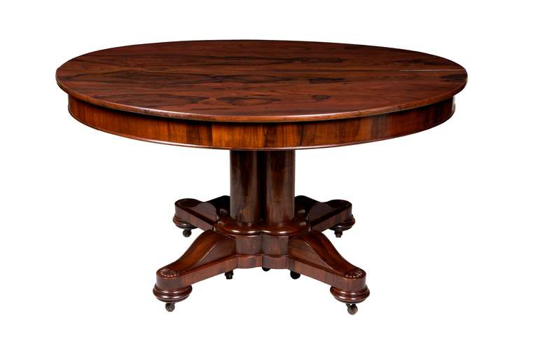 This table is a standout. While most examples of this model are mahogany pieces, this is the only one we've seen with rosewood, which began to be used later in this period. As you can see on the top of the table, the figuring is quite strong against