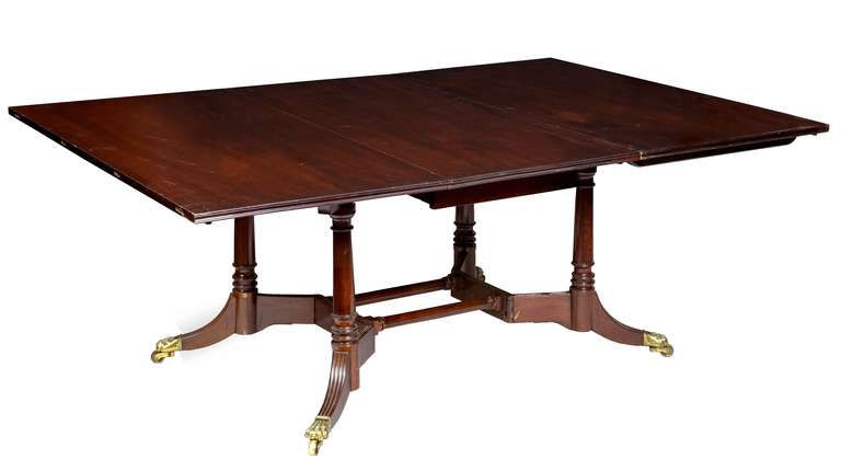 This table is composed of two smaller drop-leaf tables which, together, as intended, totals 145 inches. The mahogany is of the dense, Cuban variety with beautiful figuring throughout. These tables are very desirable, because one doesn't have legs