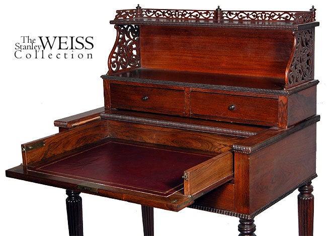 This compact desk was probably manufactured in New York by one of the Fine woodworking shops of the time, i.e. J. & J. W. Meeks. This is revealed by the exceedingly Fine craftsmanship evidenced throughout its construction such as the fretwork above