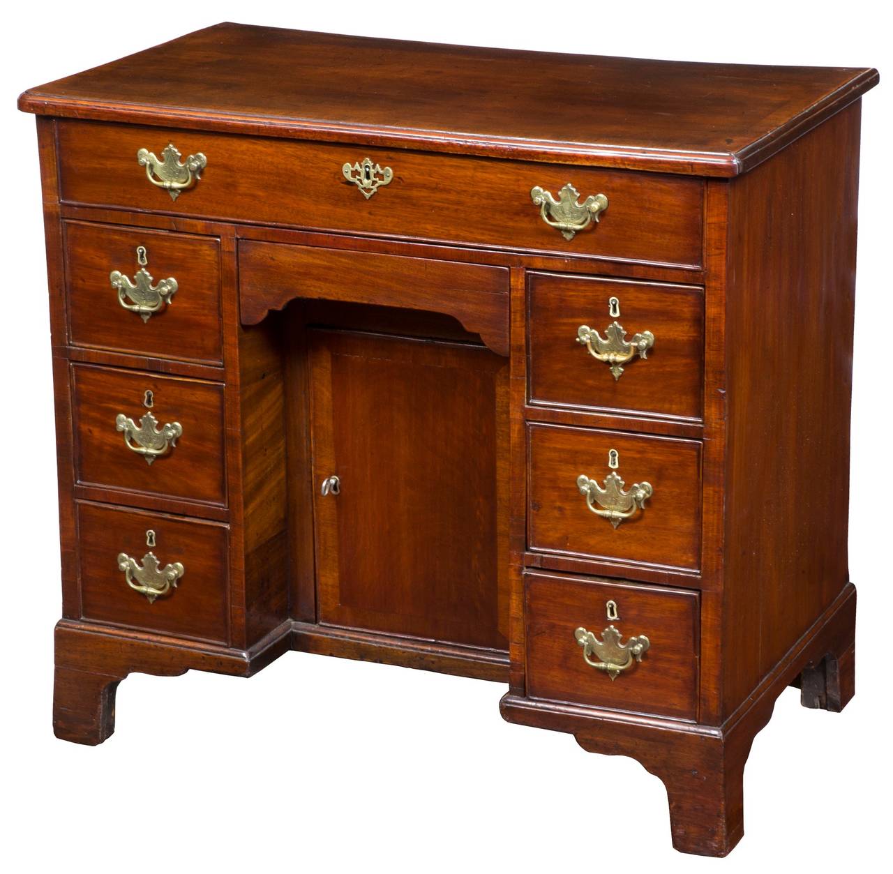 This mahogany kneehole desk is like many of those that were produced in its era. Generally, these are reasonably priced, although many have major elements that have been replaced over the years, e.g. bracket feet and especially the tops. This desk
