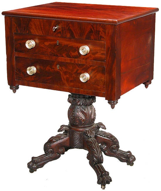 This work table has about the finest carving to be found on this form. At this period, these popular worktables, which fit nicely next to armchair or sofa, were manufactured by many shops in New England and were of varying quality.

Please note