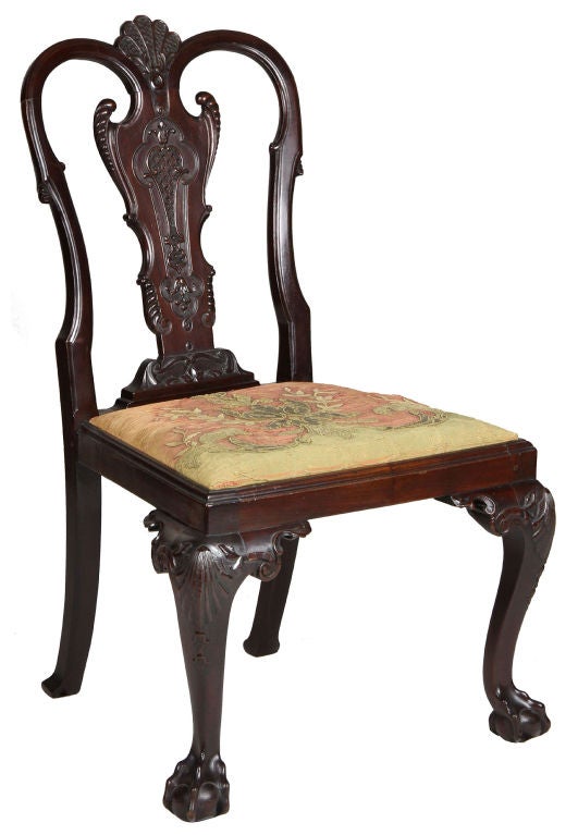 This is a very exuberantly carved set of chairs, the design of which relates, we feel, more to Irish furniture than English with the highly decorative carving found throughout. These chairs have a beautiful stance and proportion, see profile image.