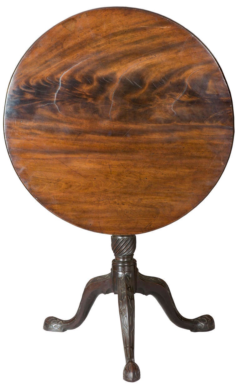 This table appears unassuming at first, but starting from the top; it has a wonderfully figured mahogany top with beautiful color composed of well-chosen stock, and is a showstopper. For an English piece, having a birdcage is quite rare, but there