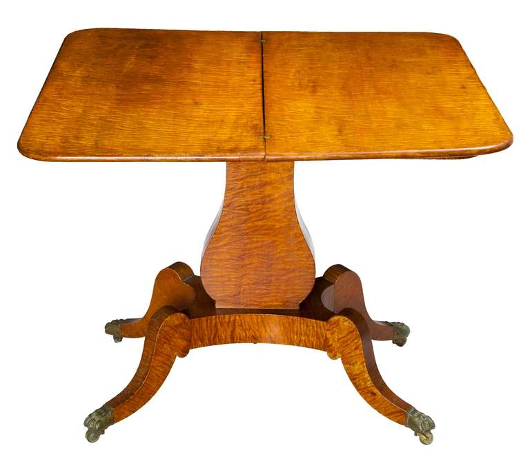 We have never had a table with an outstanding presence such as this, showing the most beautiful figured maple. The top board, as well as the one below it is solid and made of a very rare “quilted” maple. Note the zigzagging of the figure. Again, we