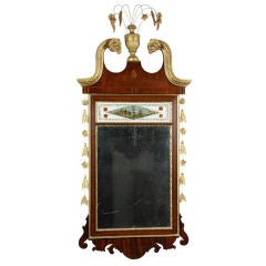 A Mahogany and Gilt Hepplewhite style mirror with Eglomise Table