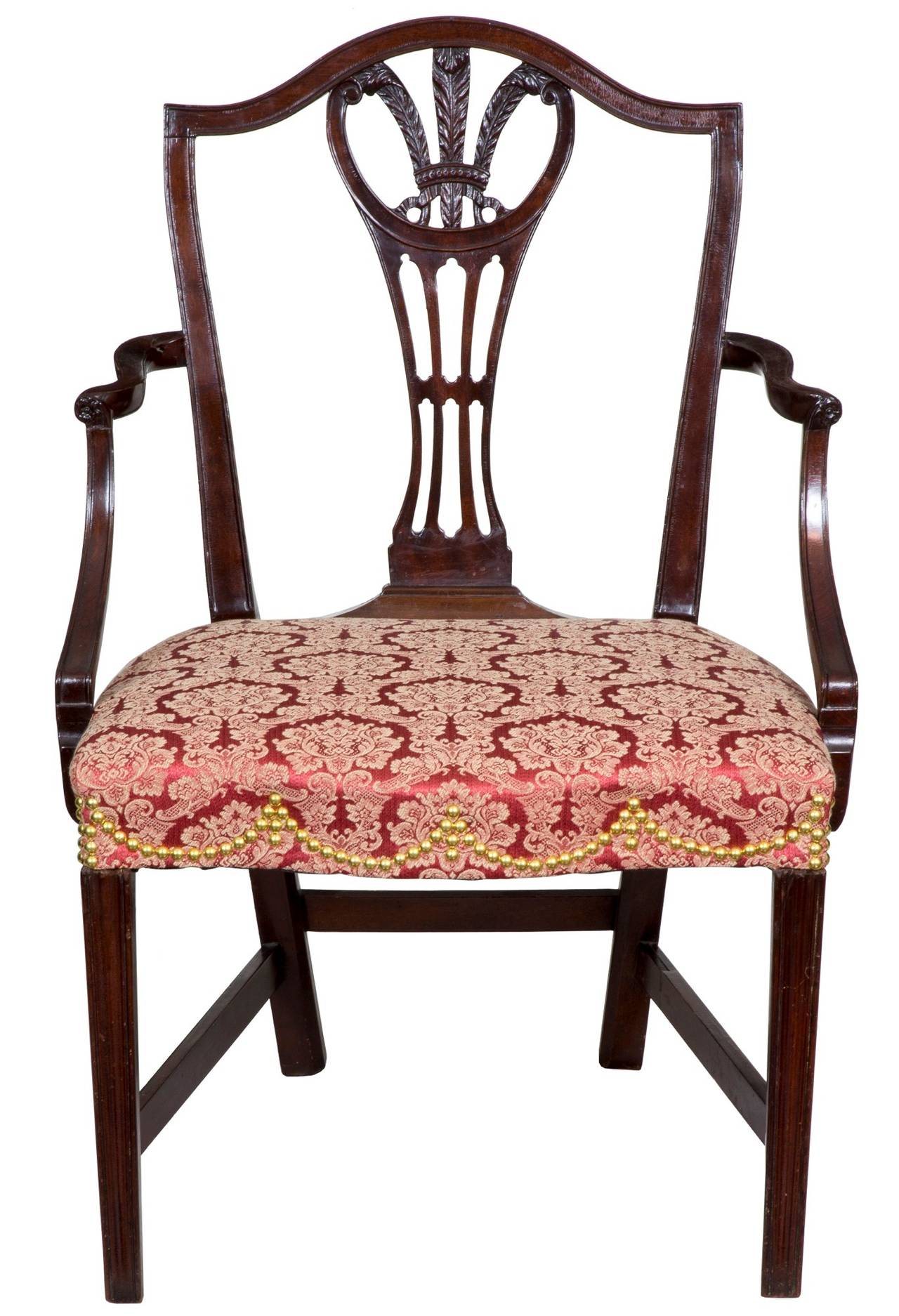 Attribution is based on a labelled chair, antiques April, 1961, page 374, George Shipley: His Furniture and His Label. 

The arched crest in this example centers on a finely carved Prince of Wales feathers splat which hearkens to its Chippendale