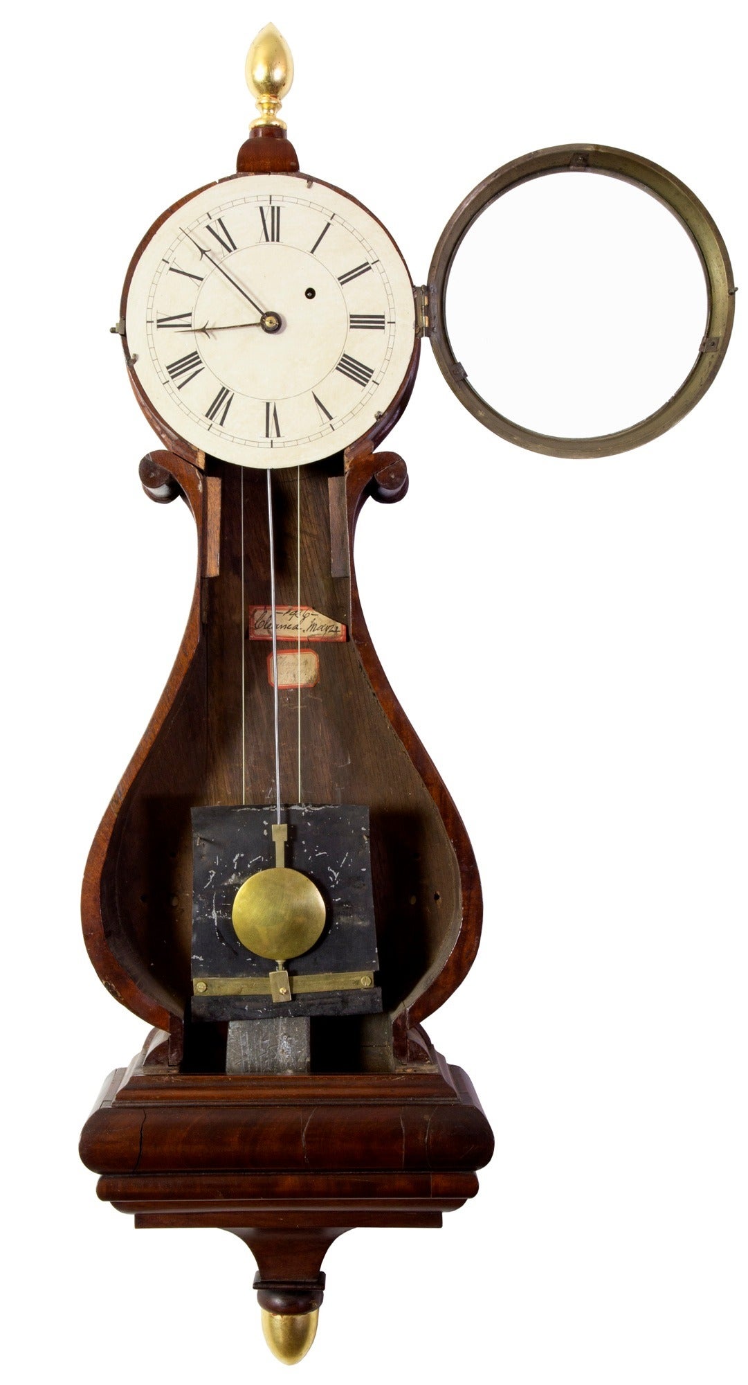 What draws us to this lyre clock is its original glass which is prominently crafted to its largest size. The other lyre model has a smaller lyre that sits on a rectangular box. All the paint is original and untouched. We have brightened up the