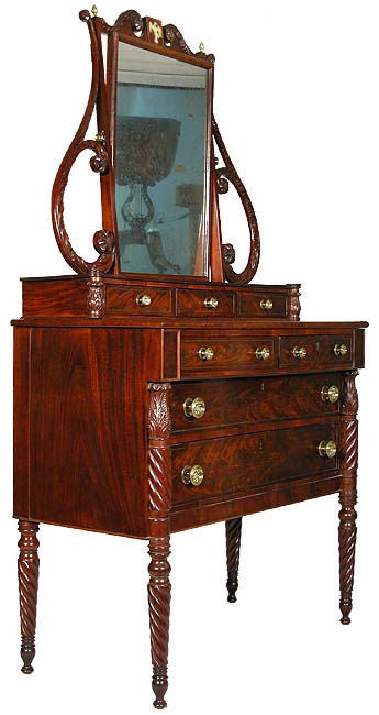 This dressing table is the finest Salem dressing table we have ever seen, and easily matches up to the best of the Boston Seymour school. Note the mirror brackets--which are twice as large as those found on the Boston example--and the magnificent