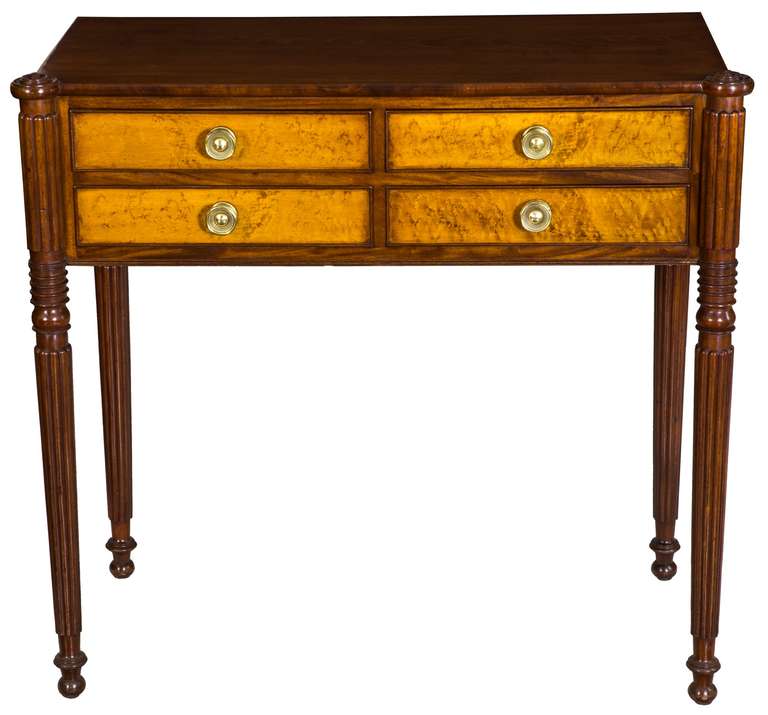 This small server has a classically austere layout of drawers which are veneered with a desirable bird's eye maple which is seen on Seymour’s early pieces. The rest of the work is classically Seymour School, but by the 1820s, as the country was