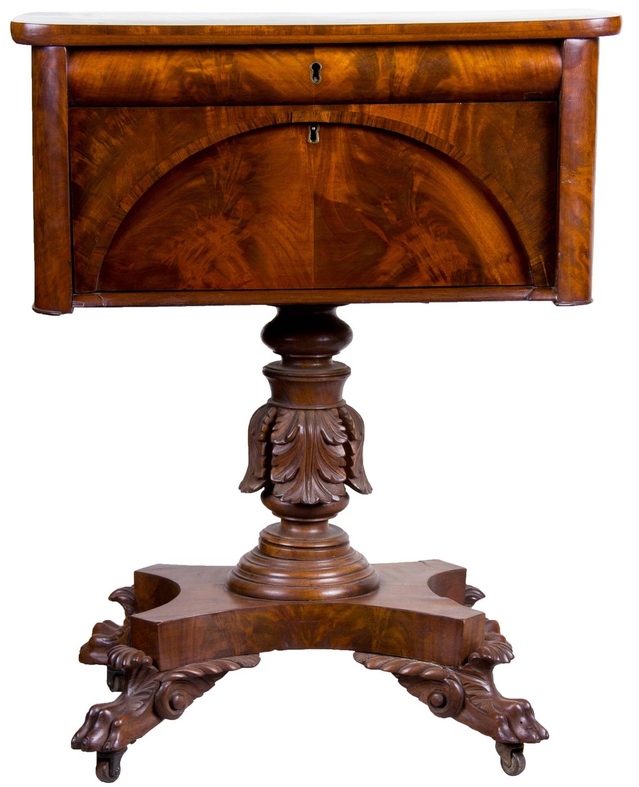 This famous, well documented table employs a pedestal base which was used by Anthony Quervelle and is the trademark of his work. A nearly identical example bearing a Quervelle label is illustrated in Antiques Magazine, August, 1973 (see scan below).