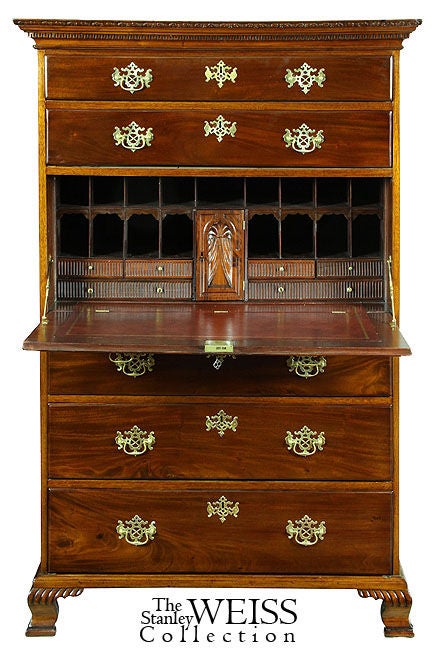 This is a wonderfully constructed secretaire or bureau, all composed of mahogany solids. Each solid drawer front exhibits the striking mahogany veining that this wood is famous for. Note the carved dental work of the cornice molding (see detail).