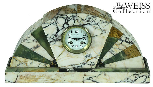 A three-piece Art Deco mantel clock set with a fine French movement. Finished on all sides, the stone quality and craftsmanship are of top rank.
