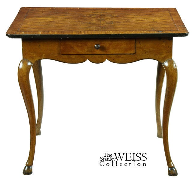 This side table, or square tea table is finished on all sides and has the most wonderfully shaped cabriole legs ending in hoof feet, an unusual and desirable feature. The apron is shaped and note how its line conforms to the lines of the shaped