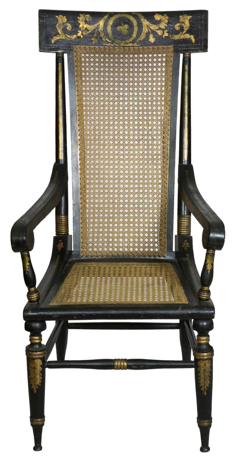 Of grand proportions, this painted chair in Baltimore painted furniture, page 67 (see scan below). It appears that the center was a defining place for individual embellishment, i.e. Clover leaf, portrait.