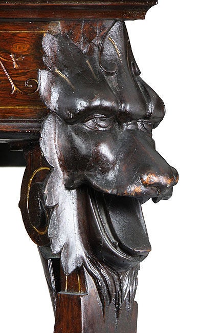 19th Century Rare Walnut Inlaid Center Table with Dramatic Wolf Heads