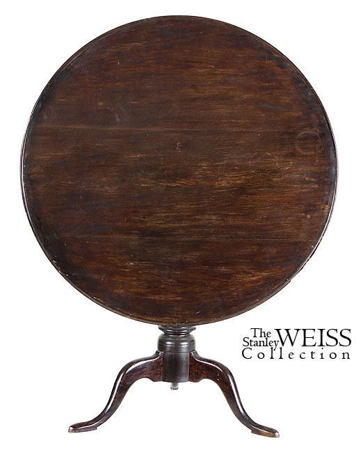 This table retains an old, dry, crusty, dark surface throughout. The top is composed of three boards, also sometimes seen in Newport tables, is understandable as cherry, like walnut, is not typically found in wide lengths. Interestingly, the cleat