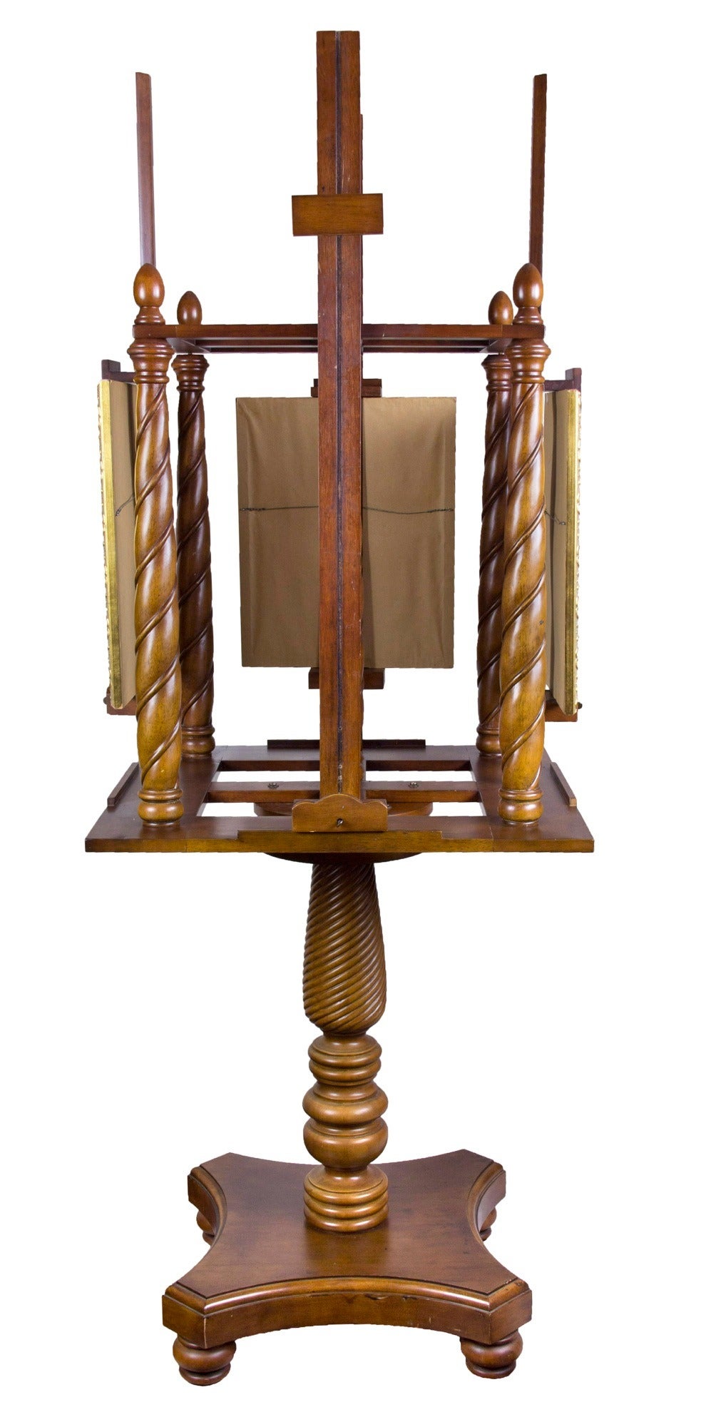 This stand is quite large and heavy. All turned columns are solid mahogany, as are their turned capitals and all picture supports, etc. While we show only four small pictures in it, it can accommodate much larger frame sizes to the extent to which
