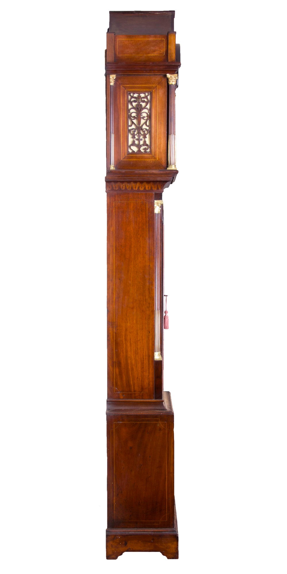 This clock is a tour de force with fabulous inlay throughout. The base is its own composition with vase. The mid-case door showcases inlaid flowers, harvest products, etc. on a beautifully striped mahogany surface as does the pagoda top and lower