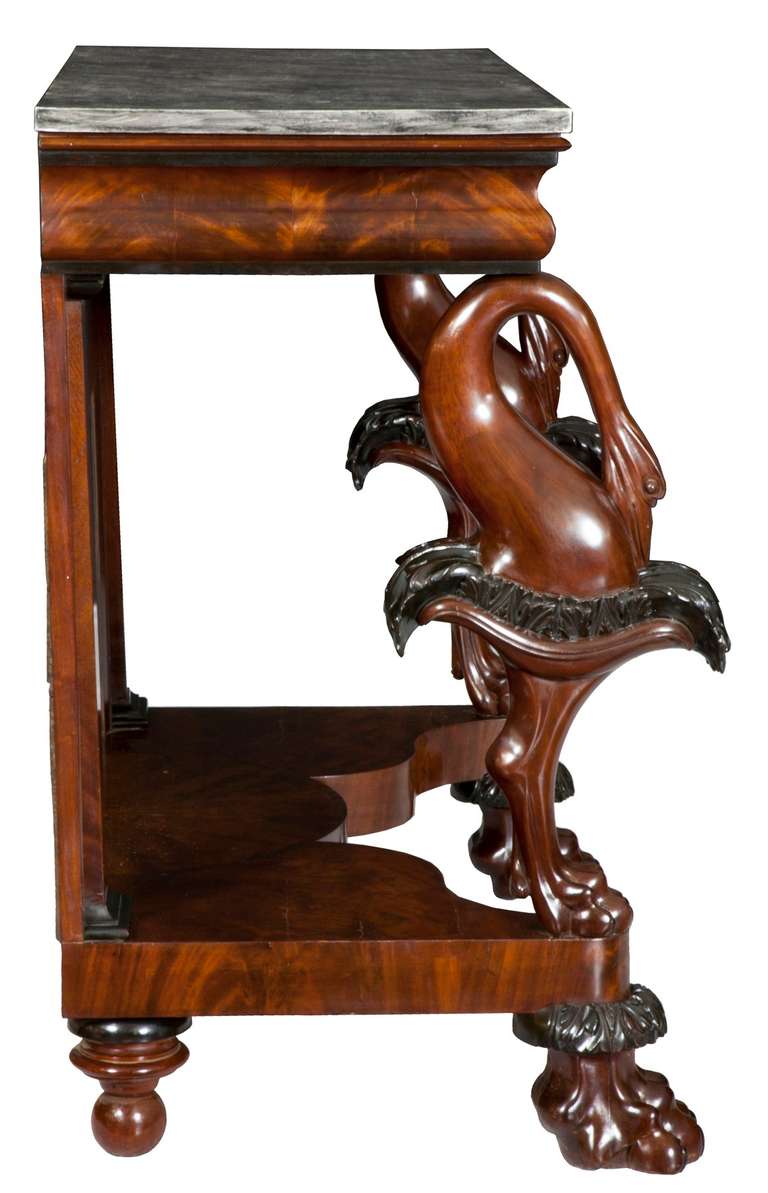 One seldom finds a pier table that can be attributed to its maker, and here, Quervelle stands out as probably the best furniture maker in Philadelphia at the time.  This pier table is quite exuberant with the carved swans and the only one we have